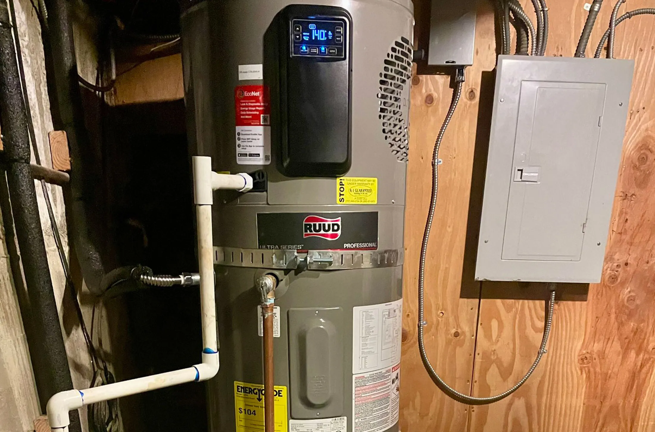Ruud water heater with digital display.