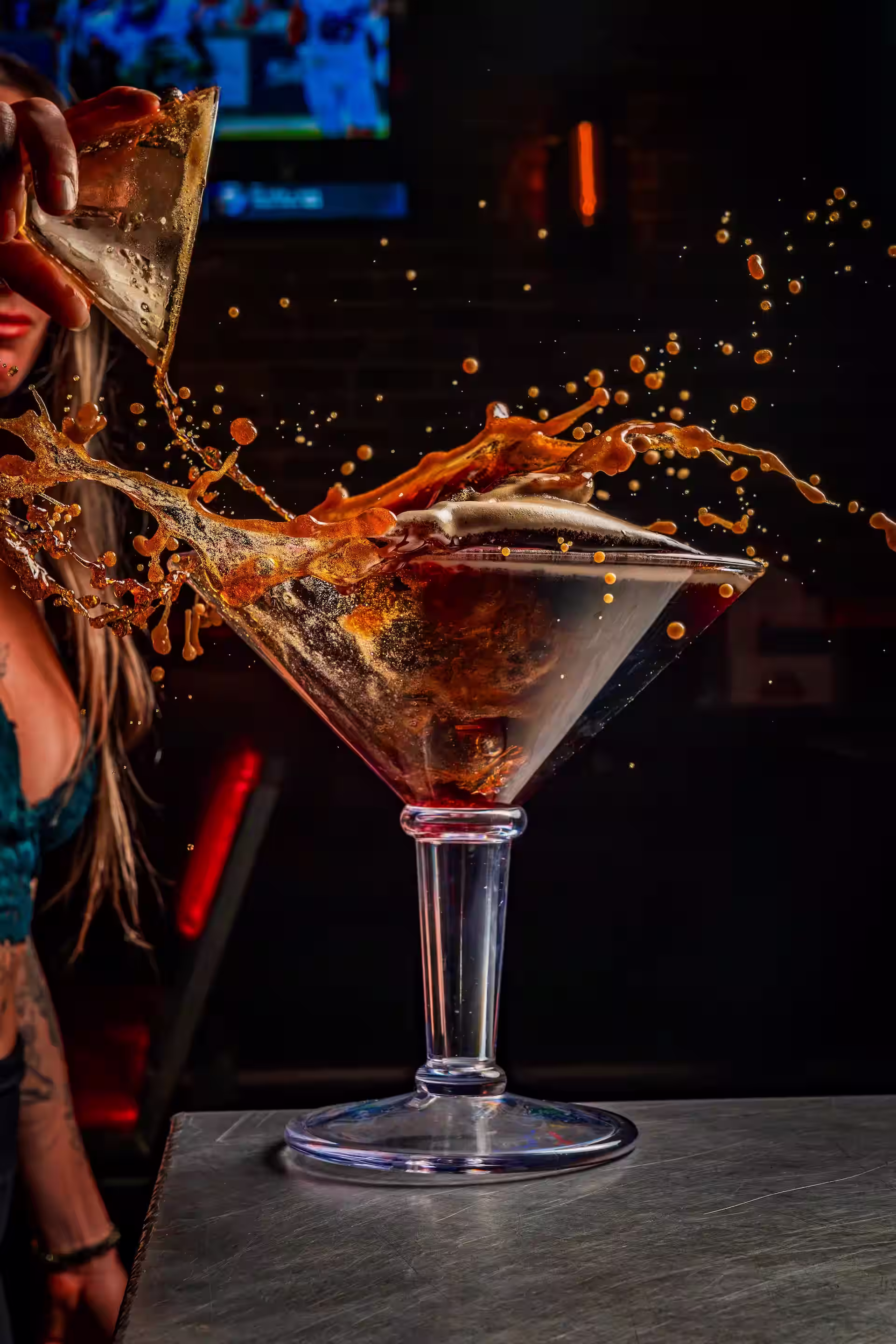 Oversized giant espresso martini cocktail with vodka, fresh espresso, coffee liqueur, and creamy foam in a large glass for indulgent sipping.