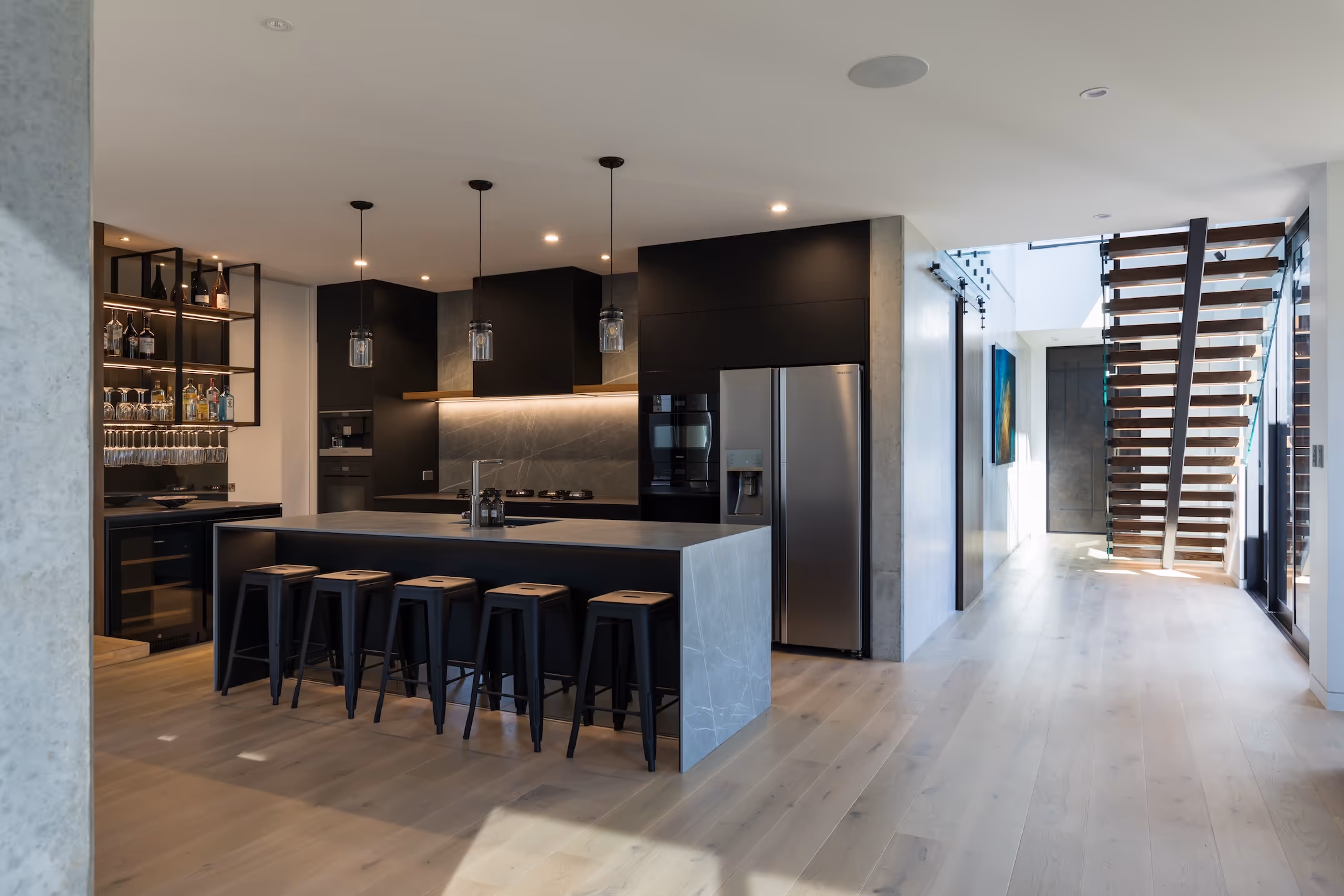 Kitchen with wooden floor.