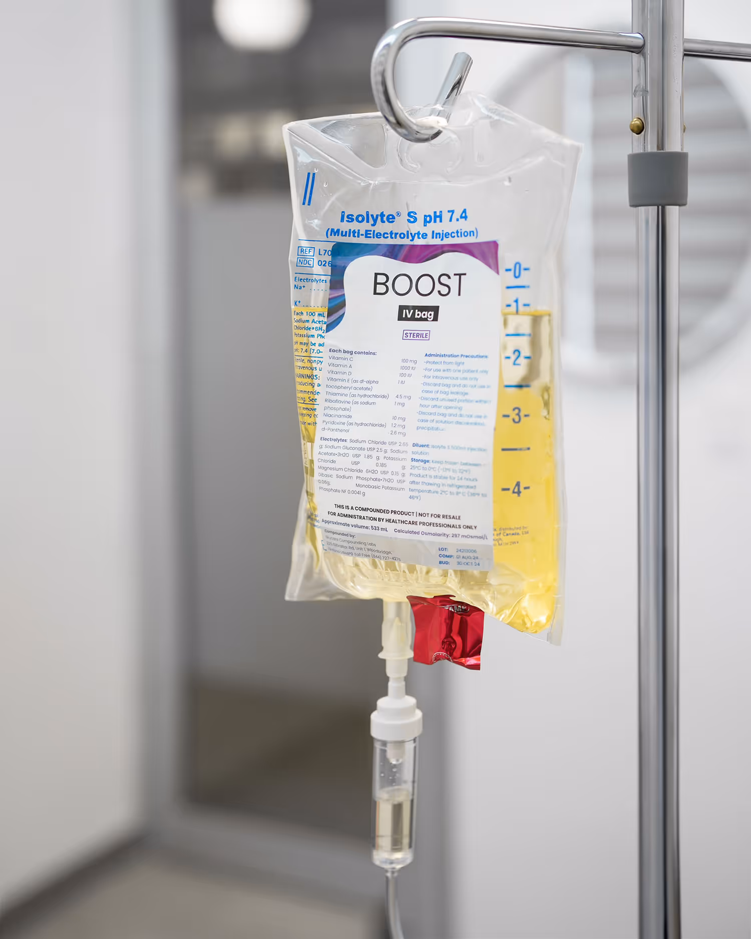 A bag of IV is attached to a medical device.