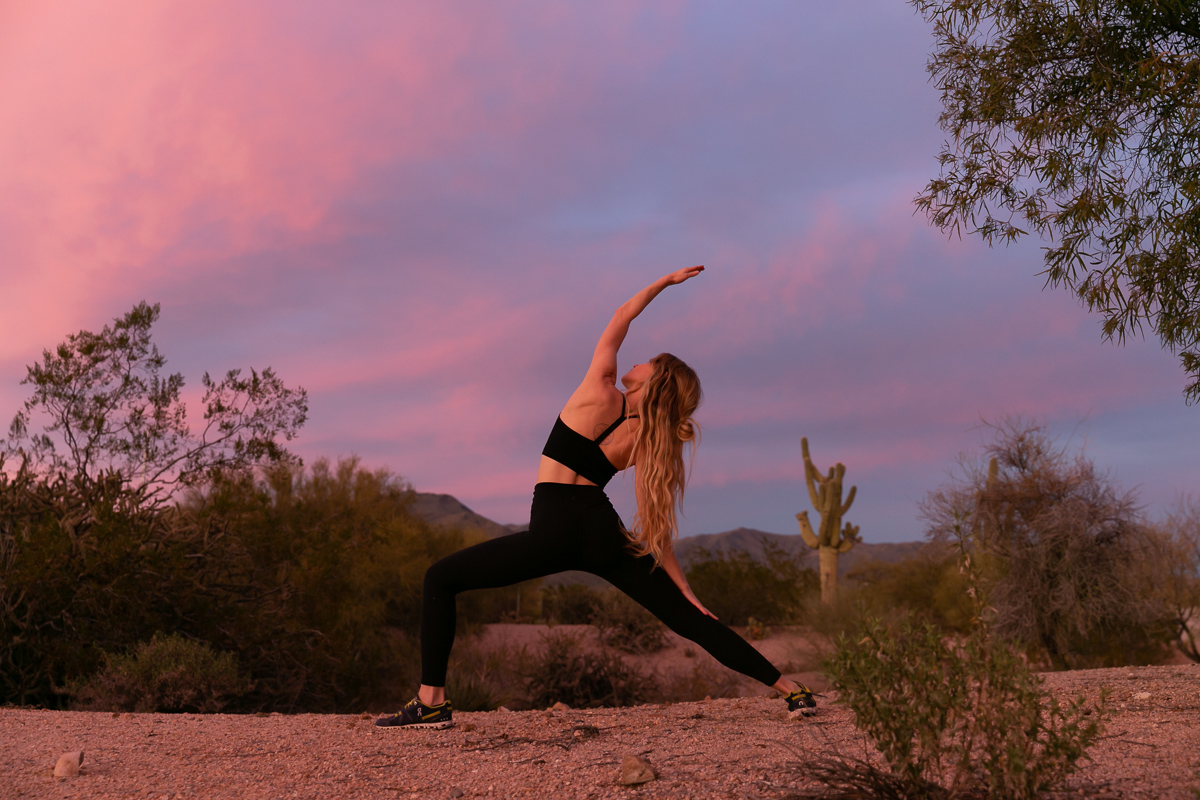 commercial photography of a woman doing yoga in the desert