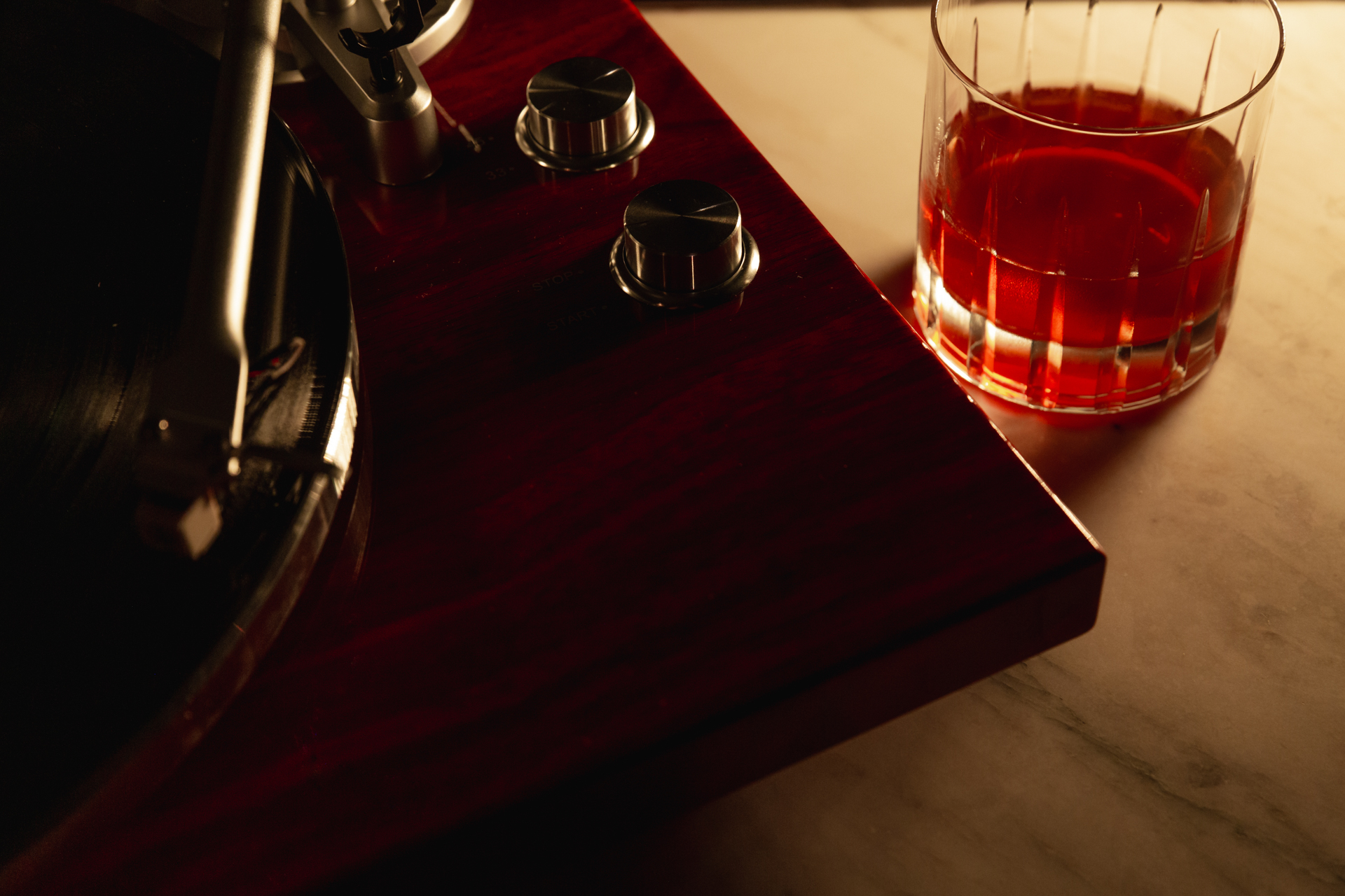 commercial photography of a cocktail and record player Drayton Hotel, Savannah GA