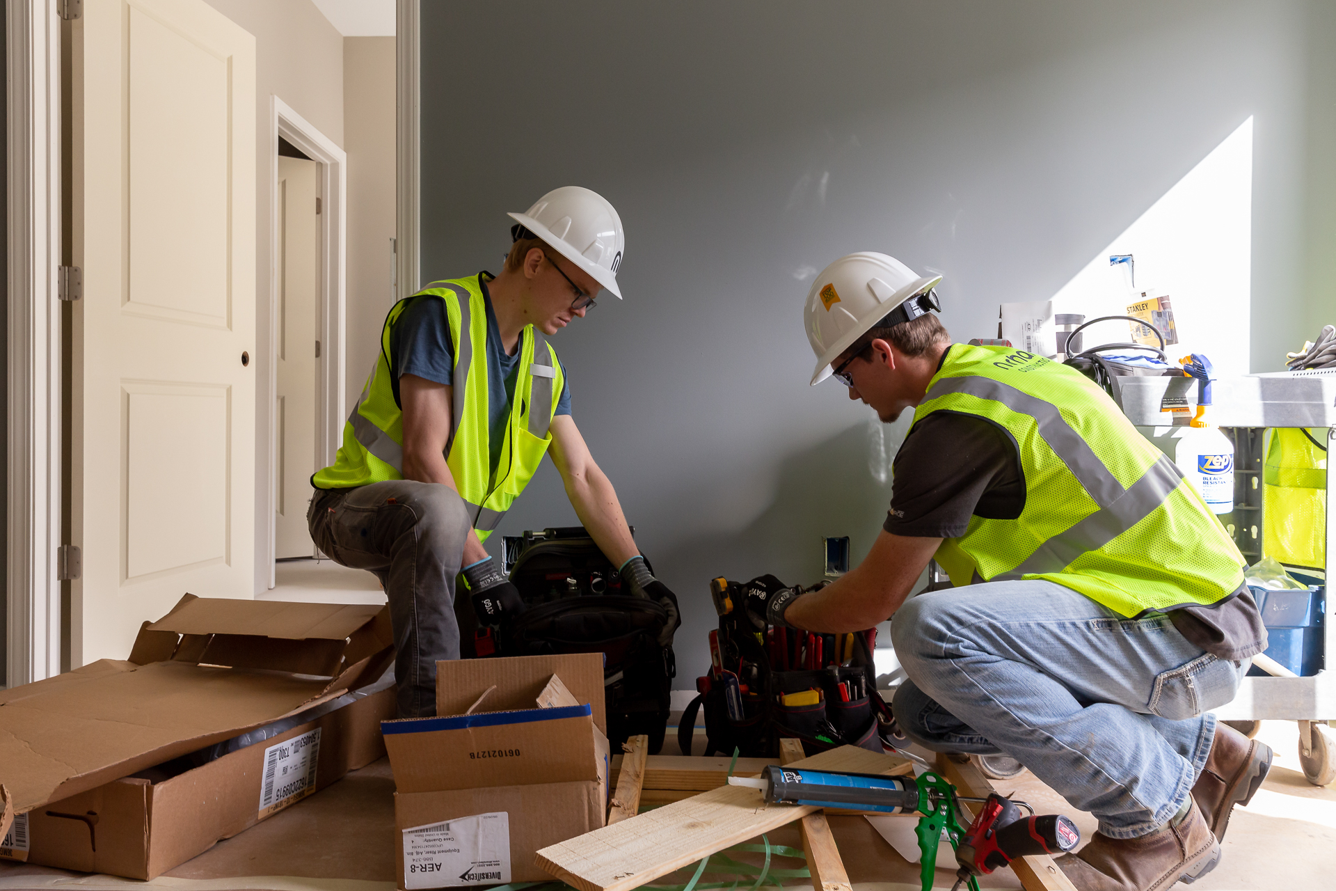 commercial photography of two men on a construction site