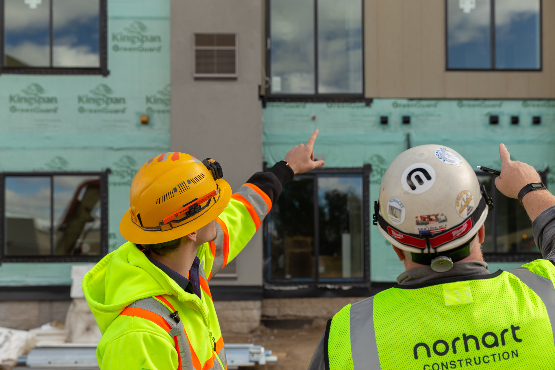 commercial photography of two men on a construction site