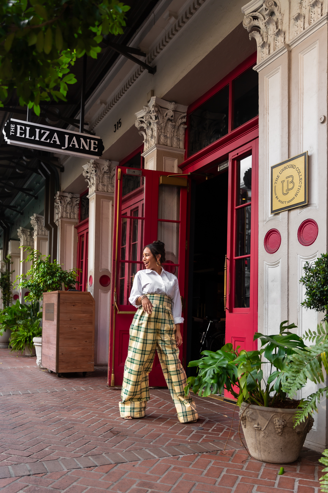 commercial photography of a woman outside at Eliza Jane hotel in New Orleans