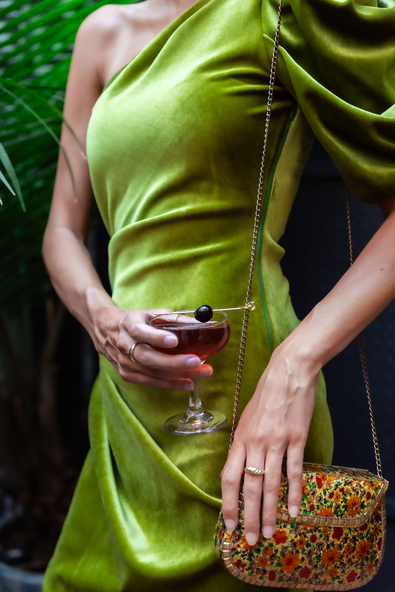 commercial photography of a woman holding a cocktail at Eliza Jane hotel in New Orleans