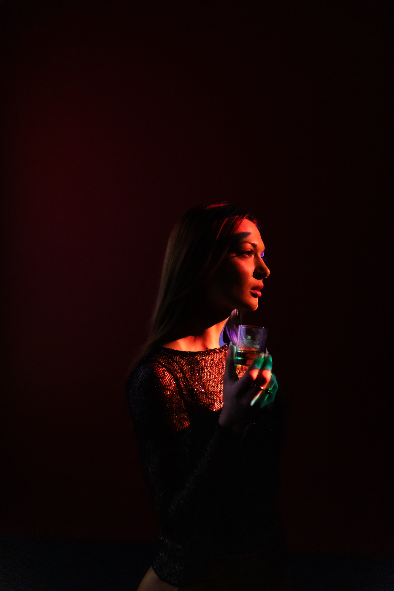 commercial photography at 21C museum hotel of a woman's portrait in colorful lights