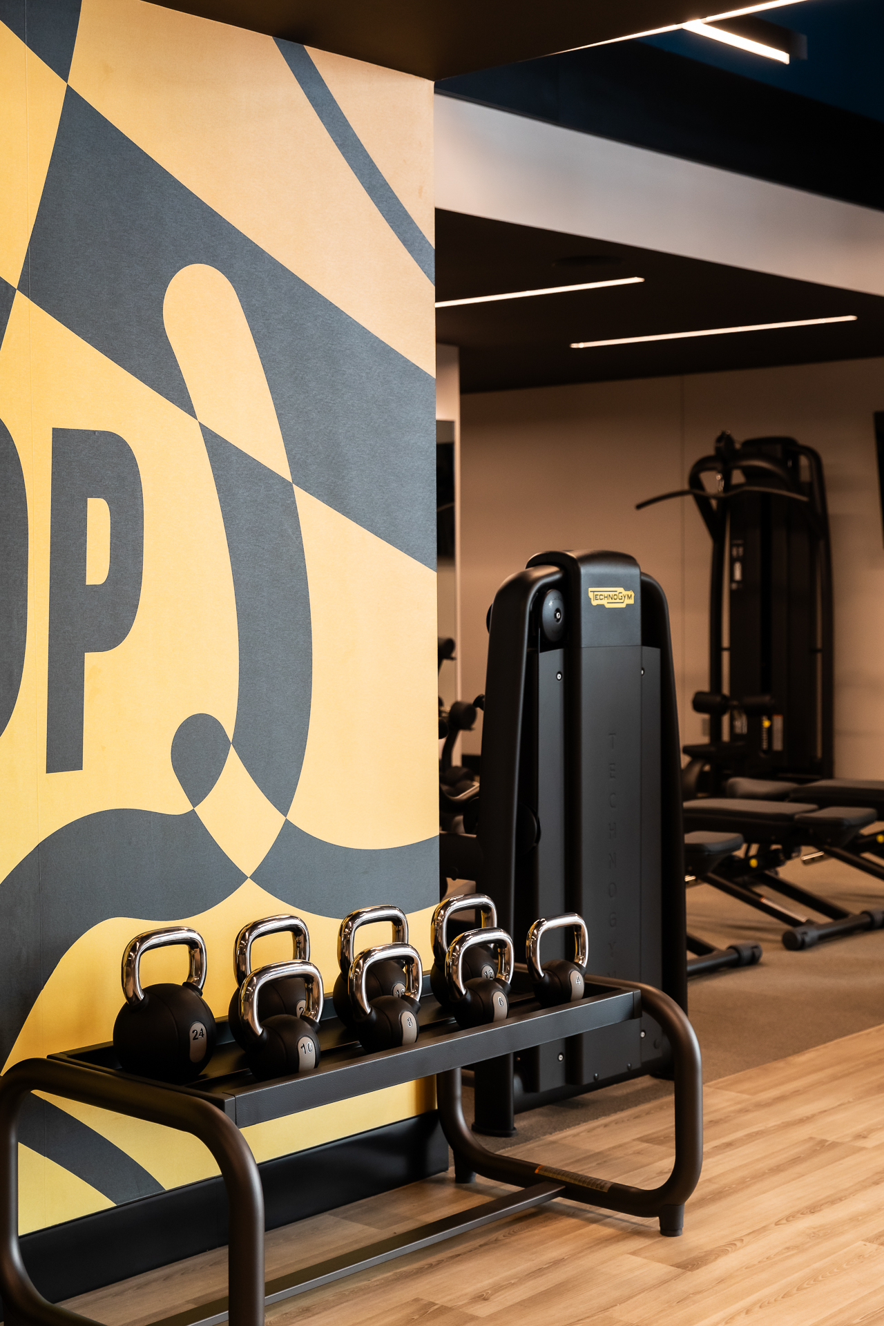 commercial photography of the gym and weights at Tempo Nashville