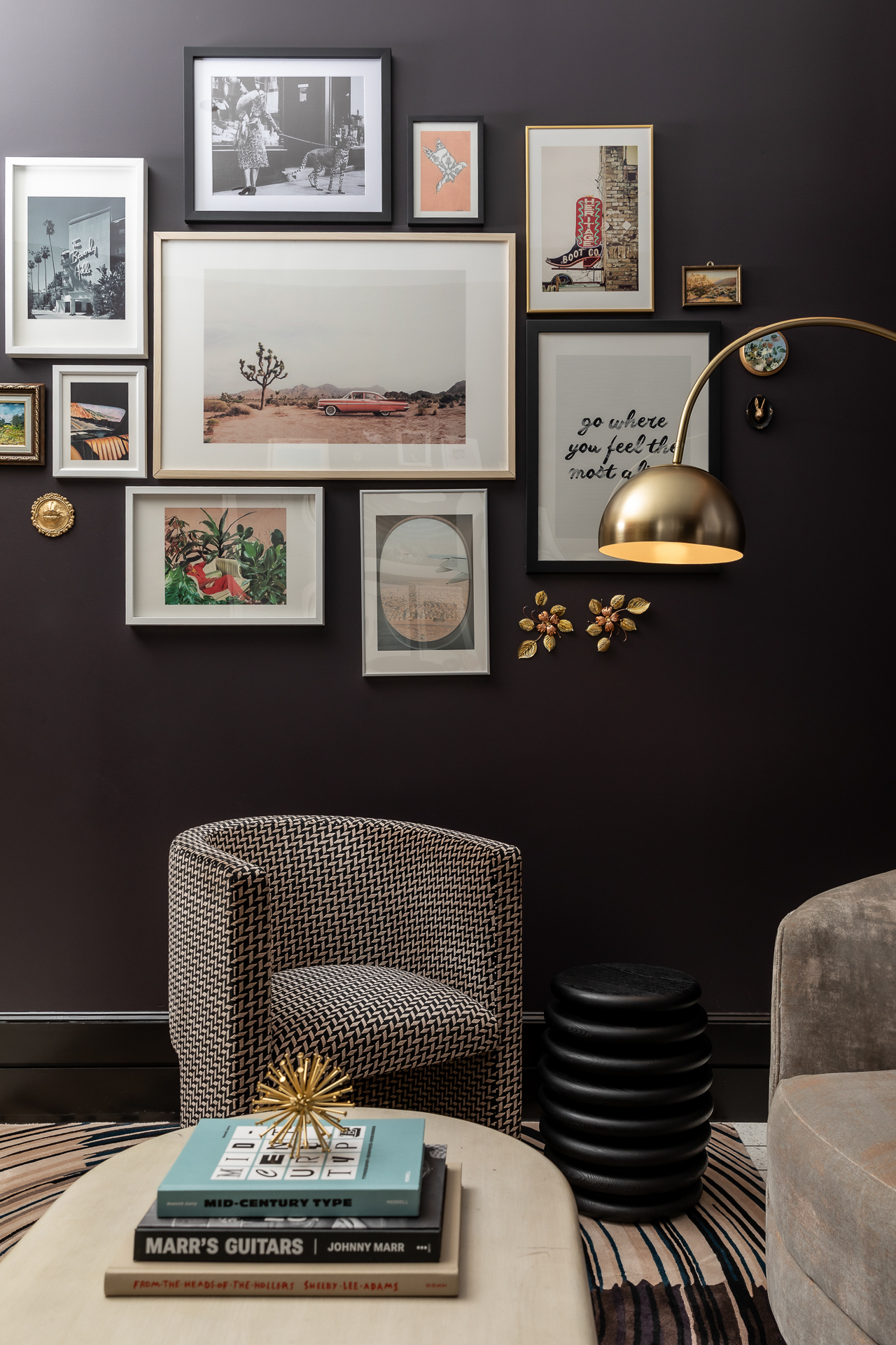 commercial photography of a seating area in tempo nashville with artwork on the wall