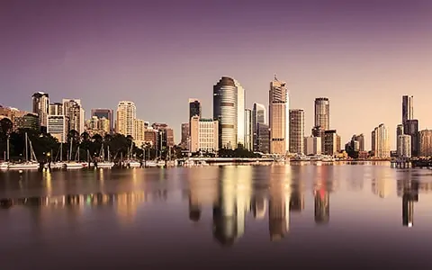 A view of a city from across the water.