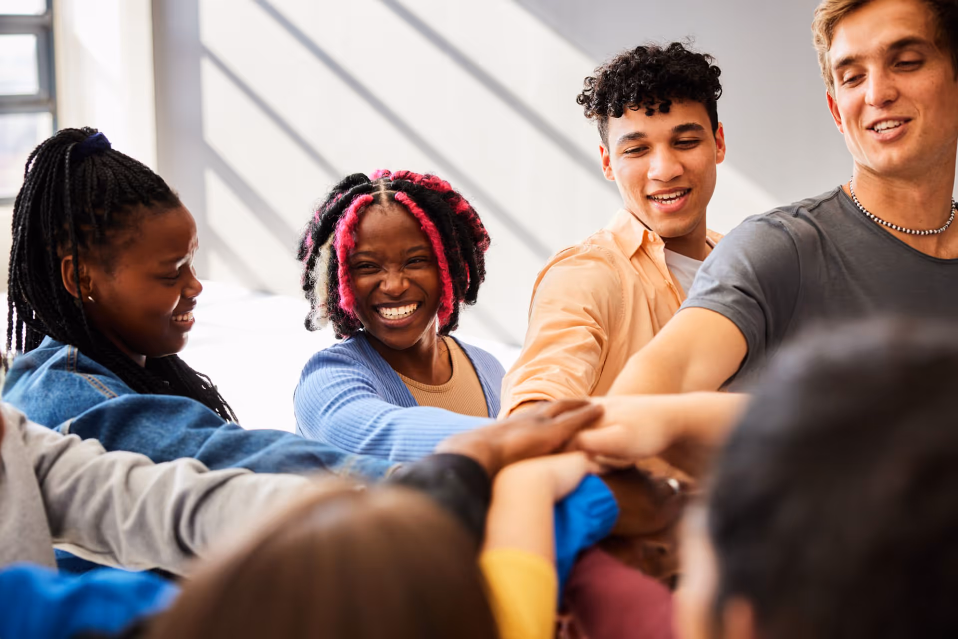 A group of young people smiling