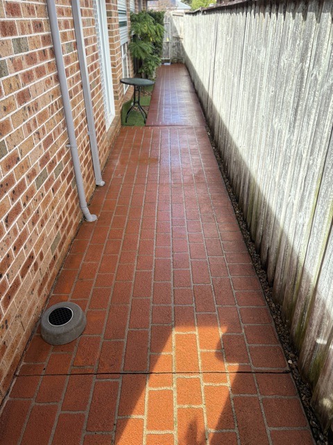 After image freshly cleaned path and fence