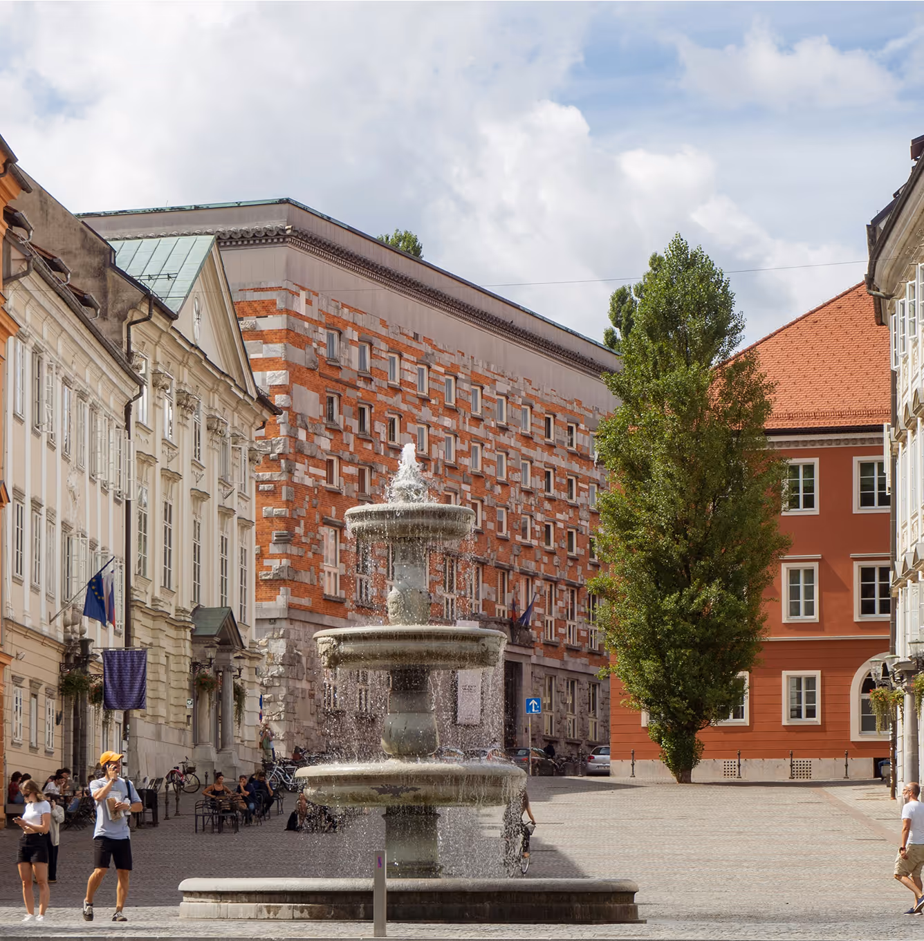 City square with fountain and colorful buildings
