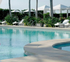 With new lower First Class fares, you might splurge on a stay at the Four Seasons in Miami.