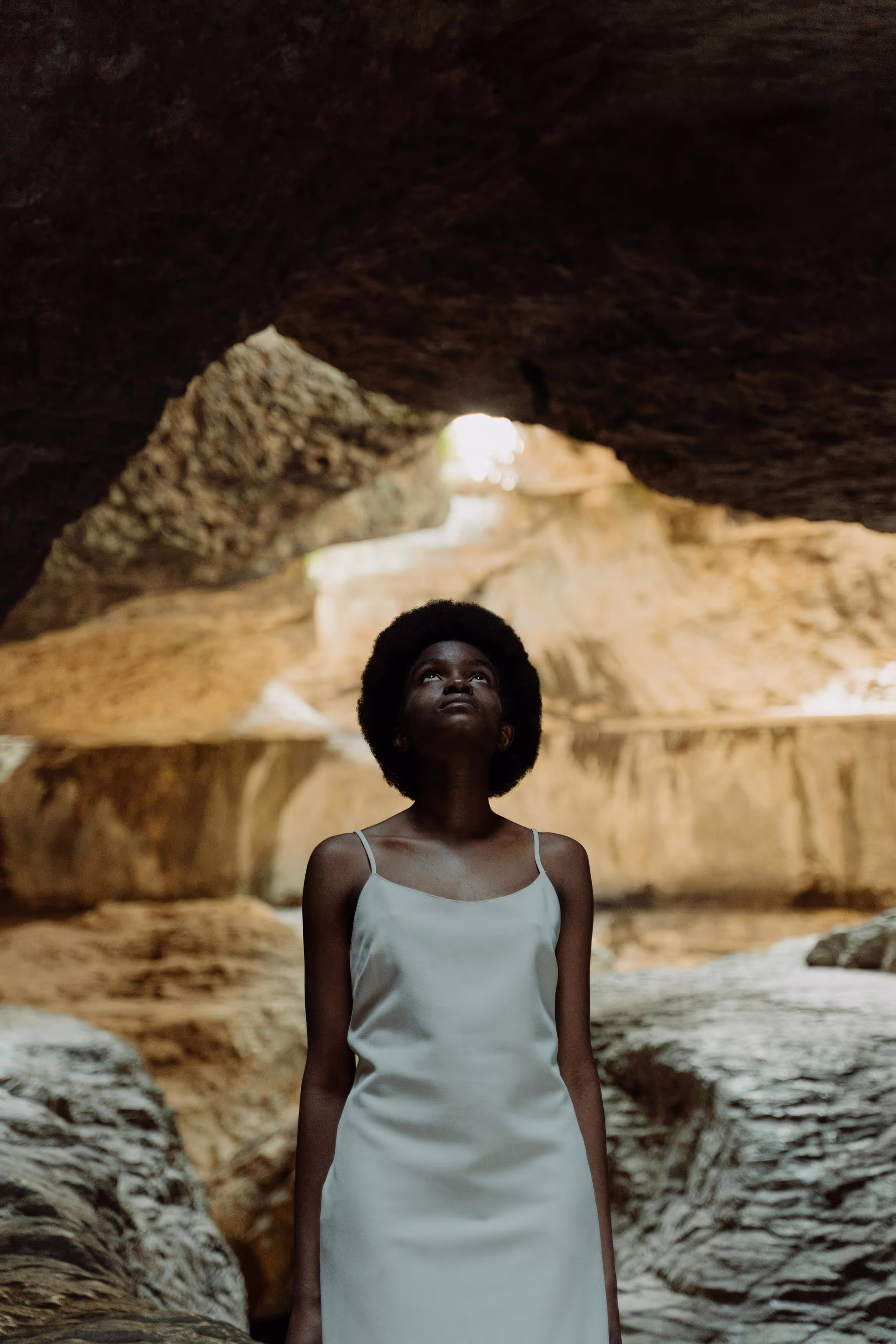 Black woman inside a cave
