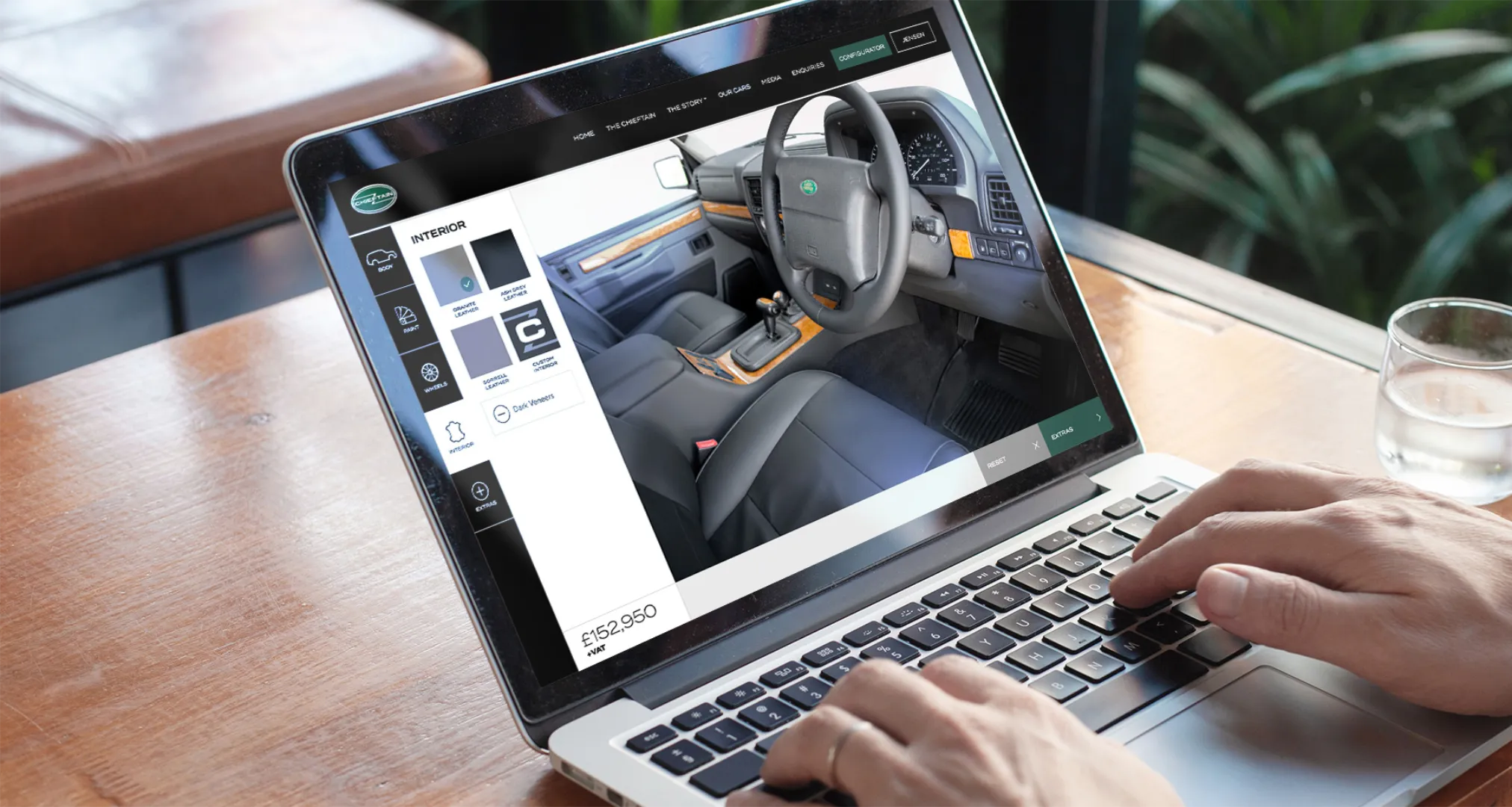 Person using the Chieftain Range Rover website on a laptop showcasing responsive website design and development.