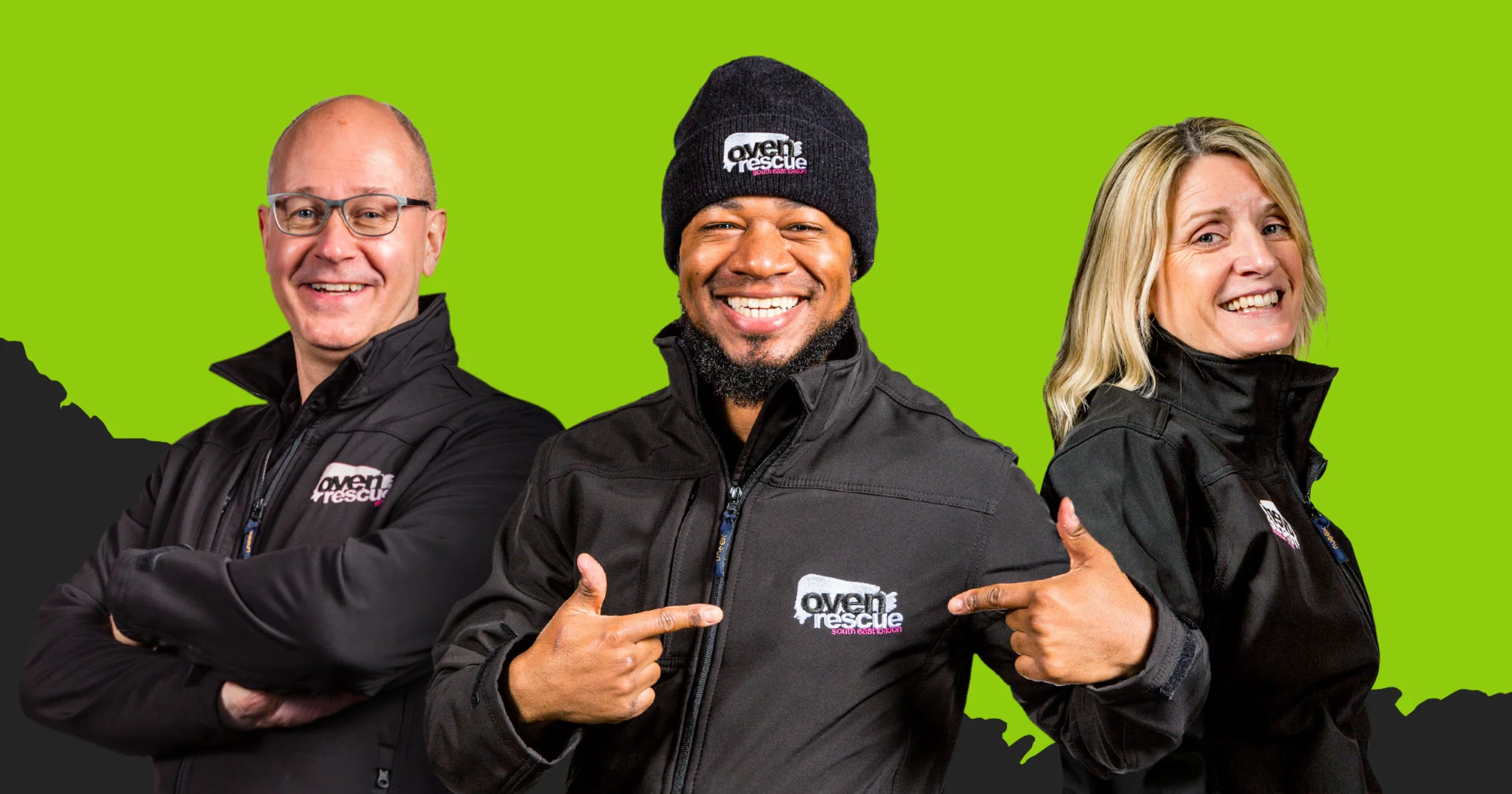 Oven rescue staff smiling in their black uniforms on a bright green background.