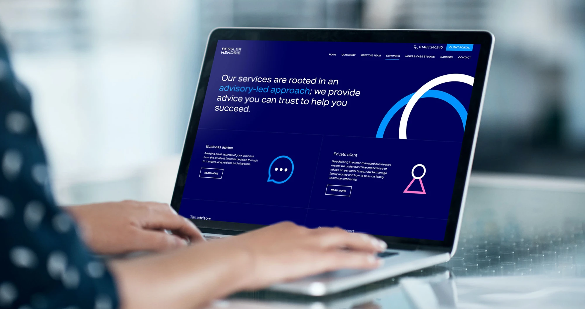 Laptop with the Bessler website running on it.