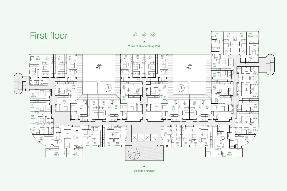 Architectural floor plan of the first floor showing multiple apartment units arranged around two central courtyards with labeled rooms and apartments, main entrance at the bottom center, and views of Gunnersbury Park indicated at the top center.