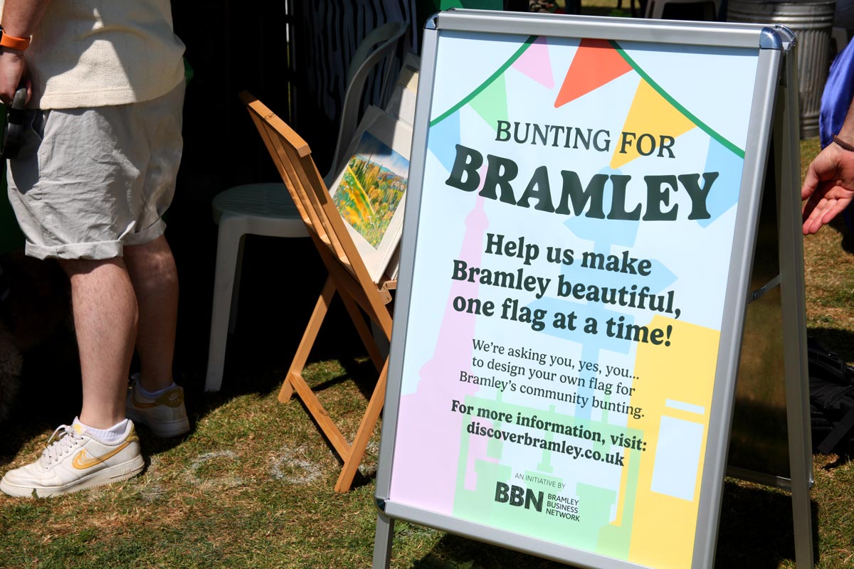 An a-frame sign with a Bunting for Bramley poster, promoting the Bunting for Bramley campaign.