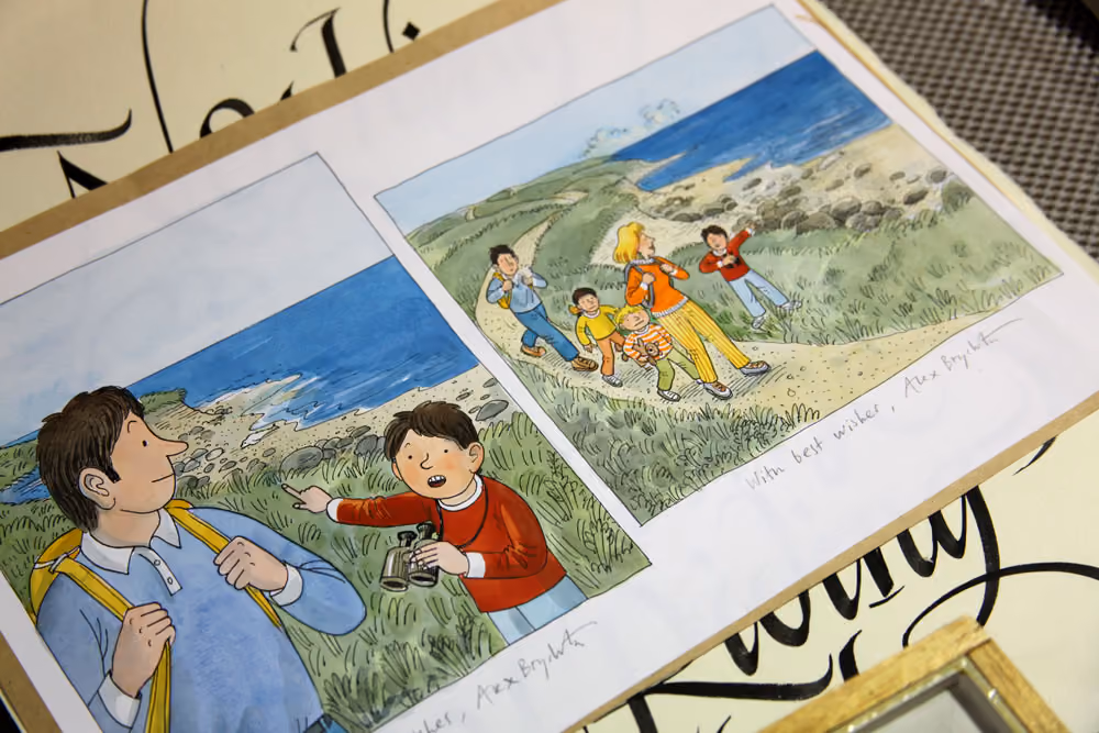 Two comic-style illustrations of people hiking near a rocky coastline with grassy hills and blue sea.