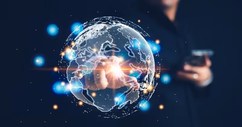 Person interacting with a digital holographic globe displaying global network connections.