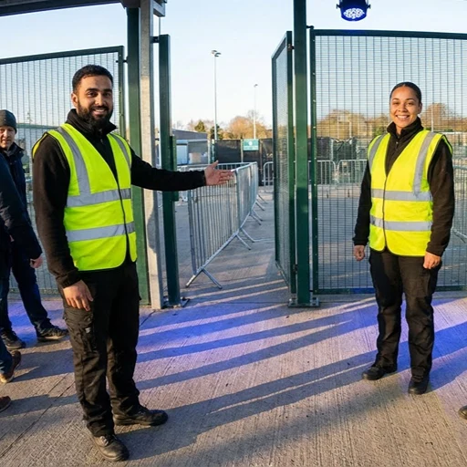 image of a music festival with vibrant colorful smoke
