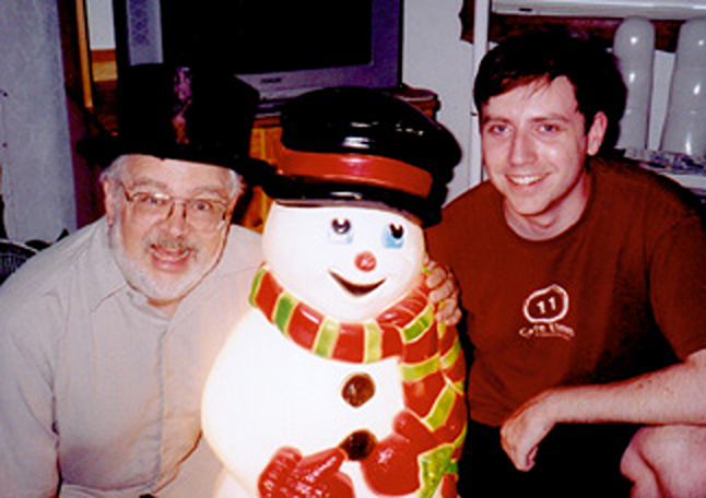 Photo of Logan Whitehurst and Dr. Demento with Venilla the Snowman.