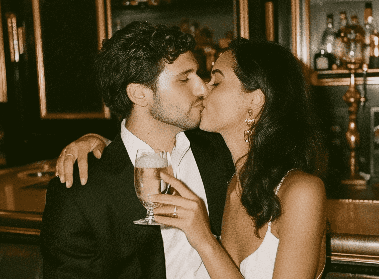 A couple embracing in a cozy bar.