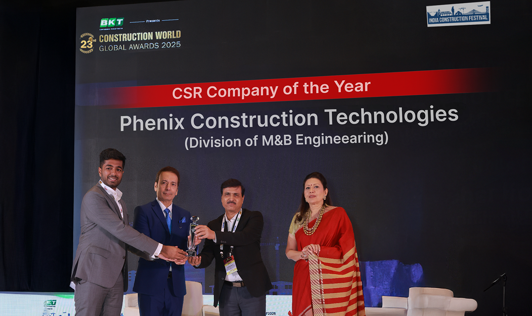 Phenix team holding awards for steel roofing solutions