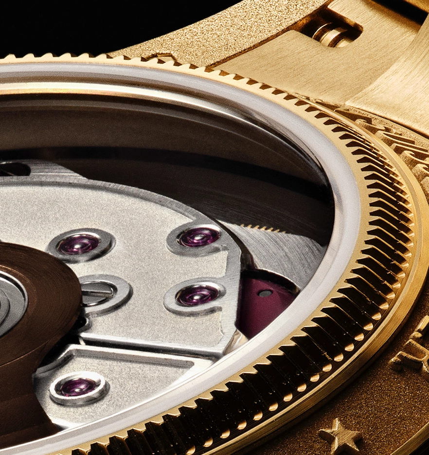 Close-up of a luxury watch's intricate mechanical movement with visible gears, jewels, and a gold bezel.
