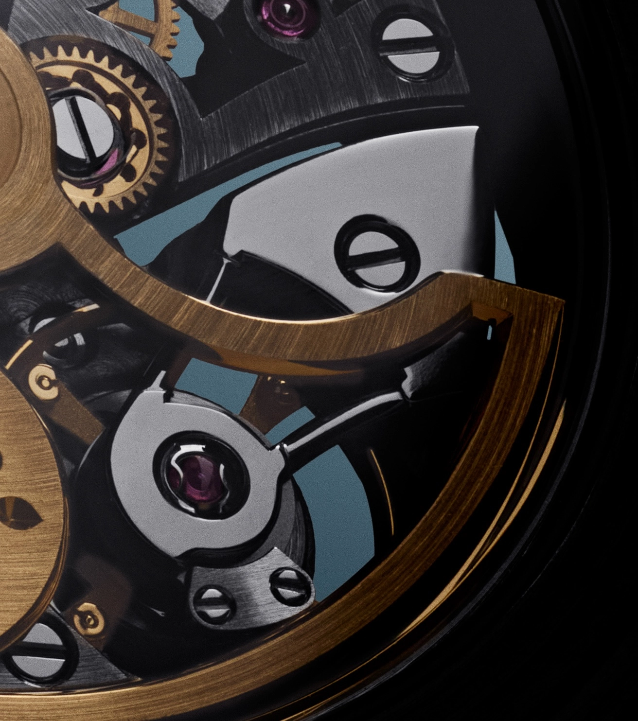 Close-up of intricate watch mechanism with gold gears, screws, and ruby jewel bearings.