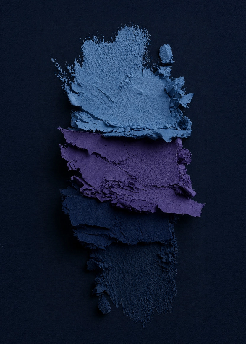 Three textured powder paint layers in light blue, purple, and dark blue stacked on dark background.