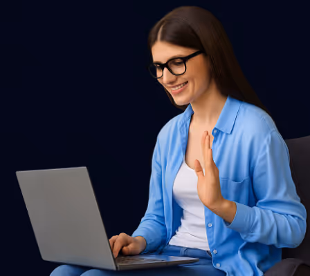 Woman on a laptop smiling | AI Expert