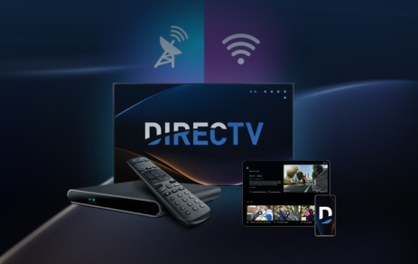 A remote control and a box of directv.