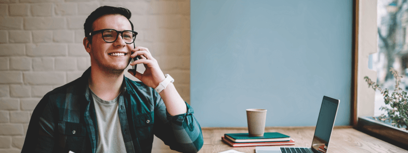 Young guy on phone chatting to a Meta consultant