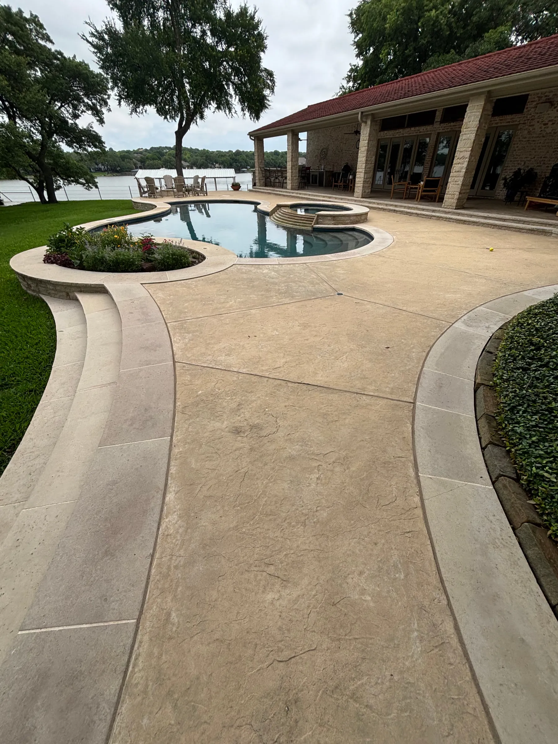 Clean concrete pool deck and patio after professional pressure washing