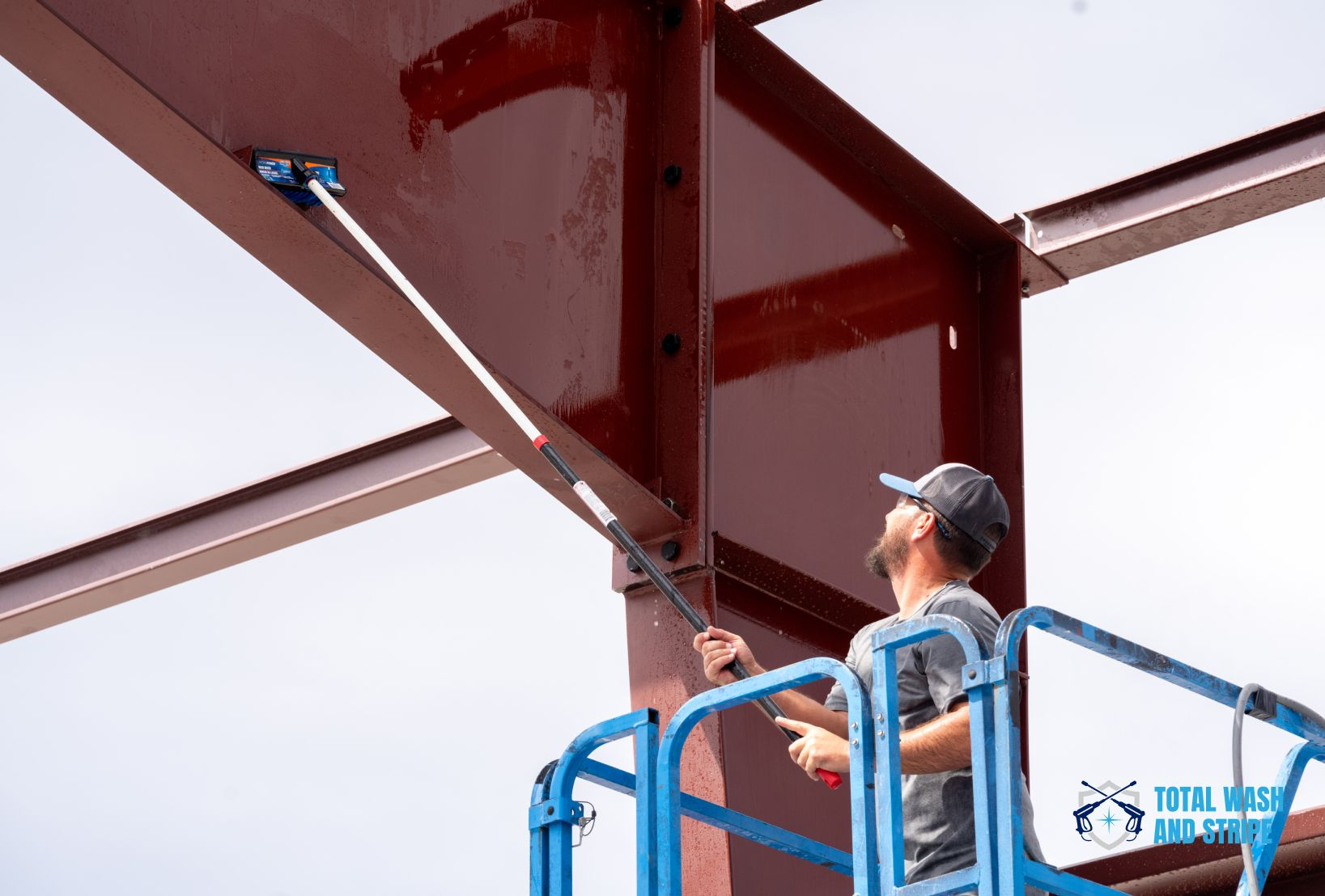Professional pressure washing of steel building columns and beams