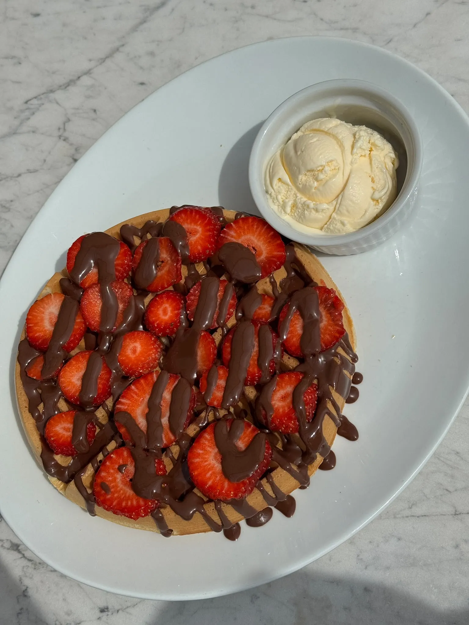 Strawberry waffle with cream