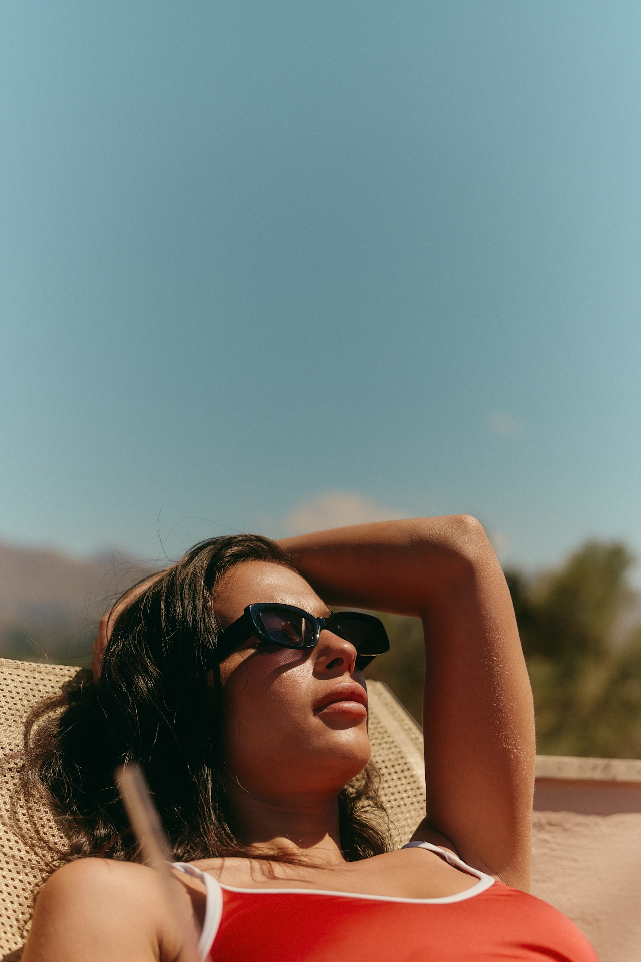woman laying in sun