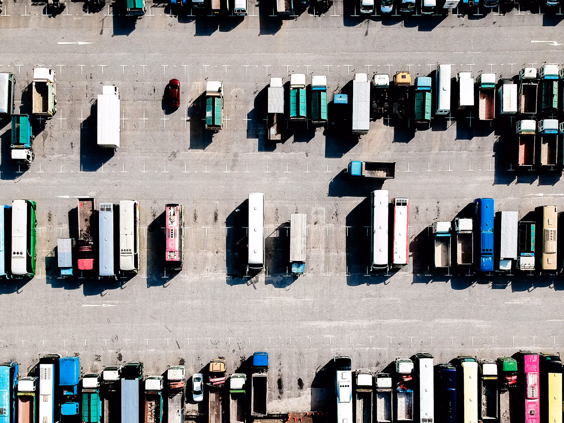 Top view of cargo trucks on a parking