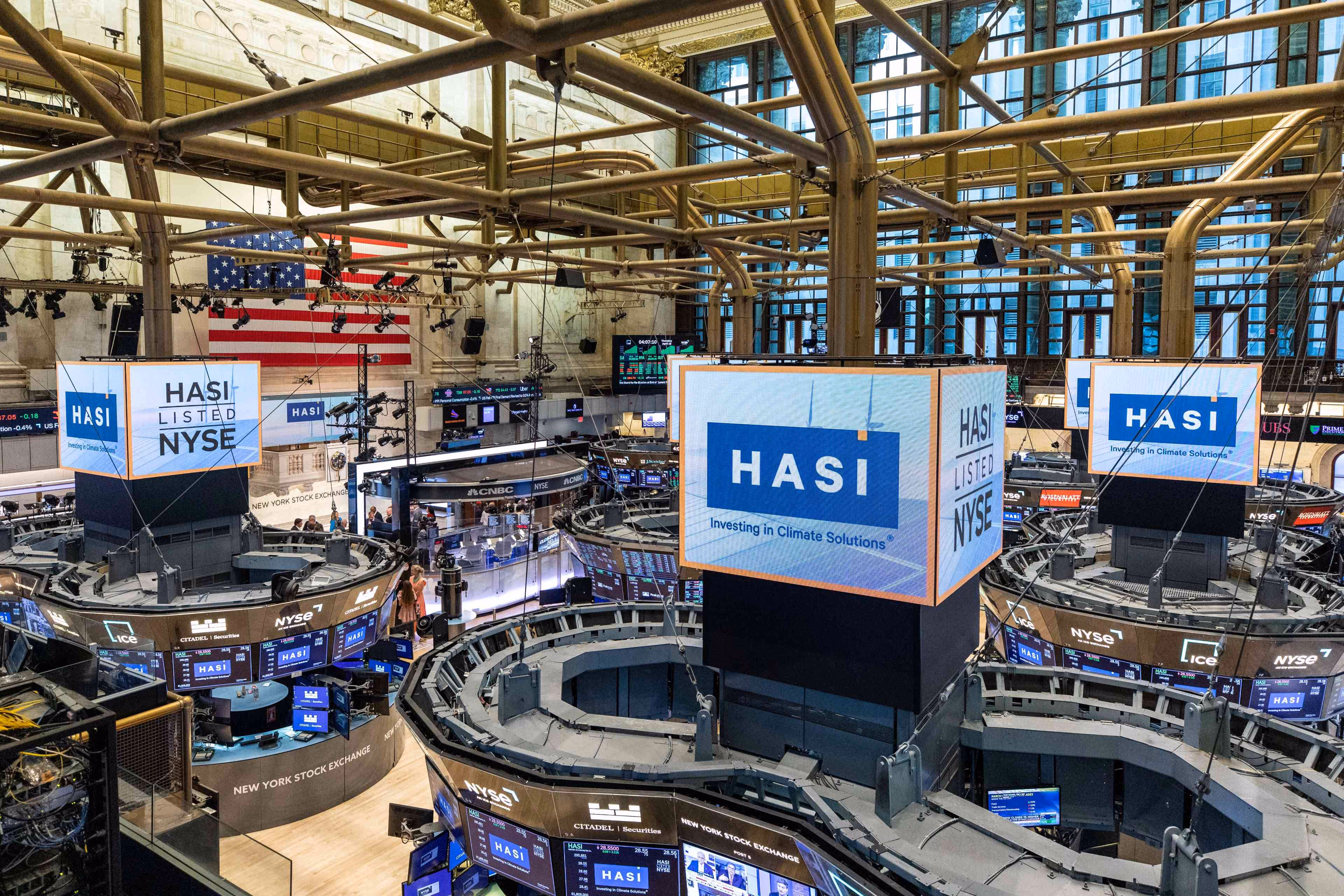 HASI logos on signs at the New York Stock Exchange.