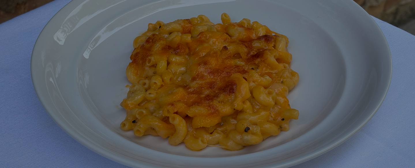 Mac and Cheese on a white plate.