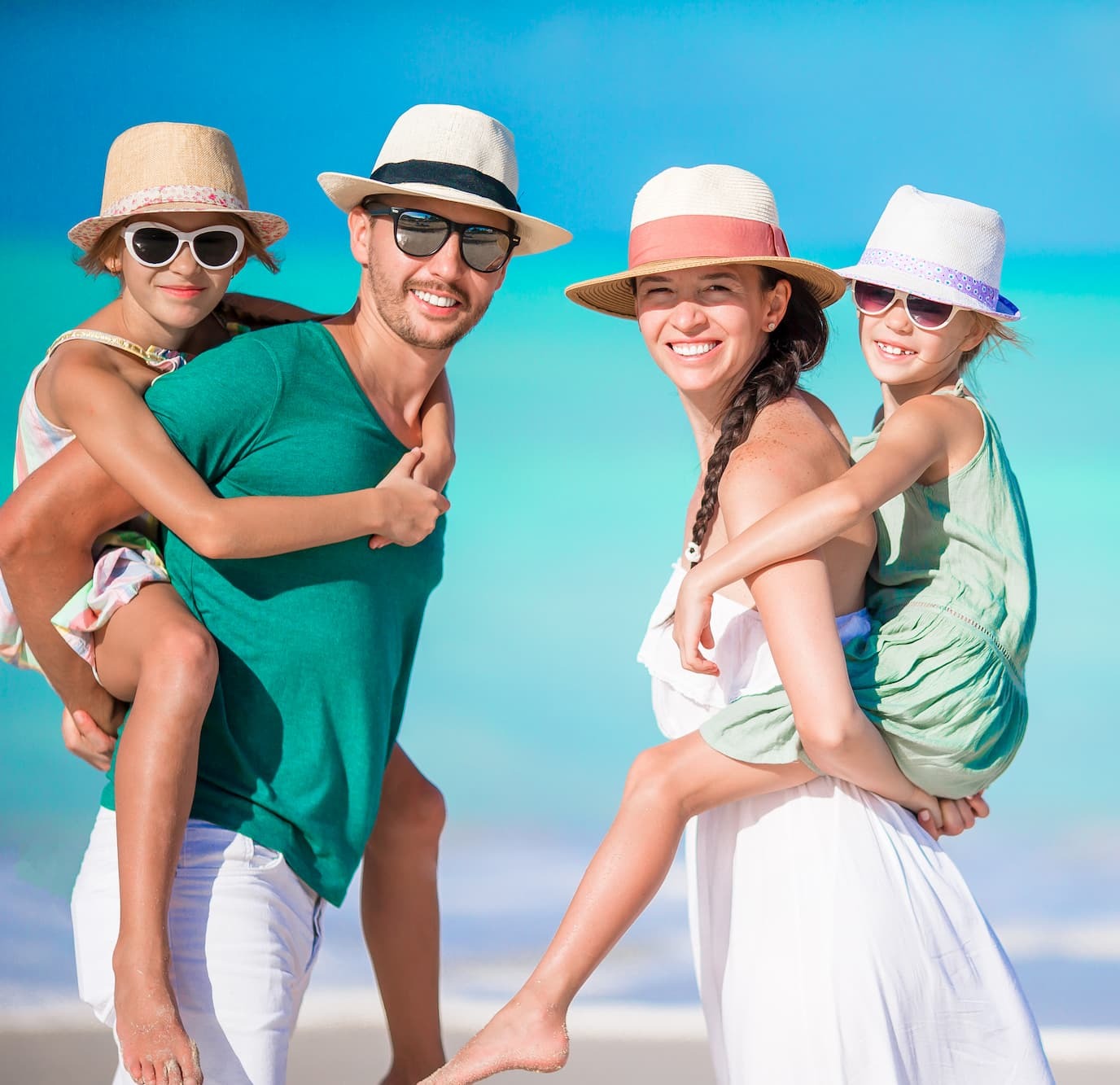 portrait of happy family on the beach