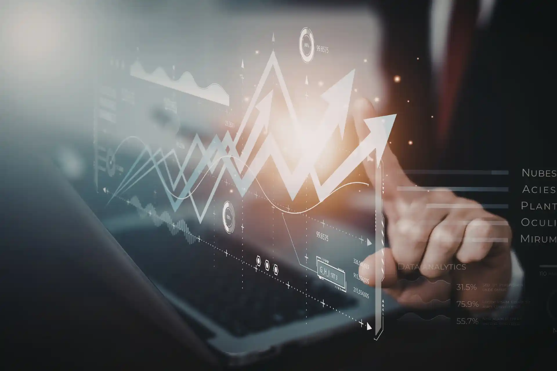 Person analysing digital sales and analytics dashboards on a tablet with glowing upward trend graphs and predictive data visualisations representing B2B revenue growth and forecasting.