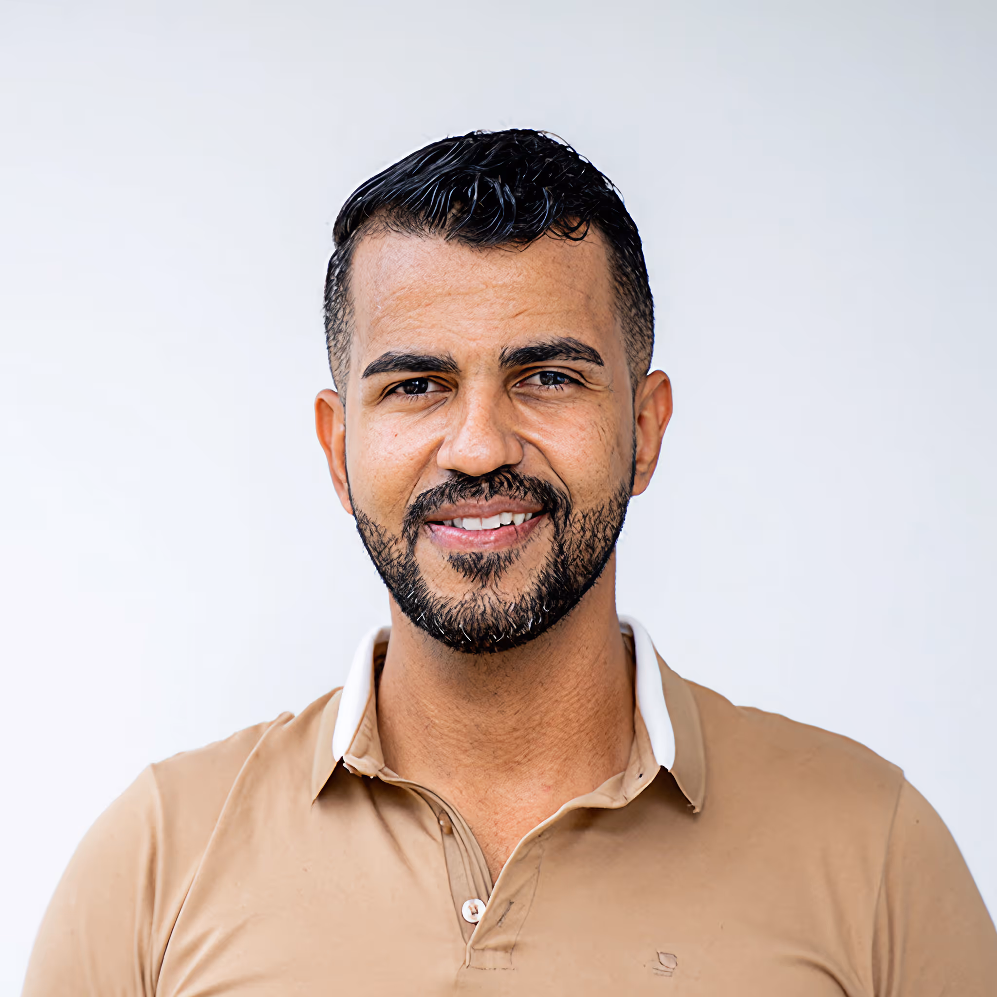 Owner and Managing Director of Axxon Looking into the camera with a smile.