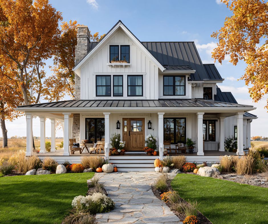 Exterior view of two story home with modern white board and batten siding and black framed windows