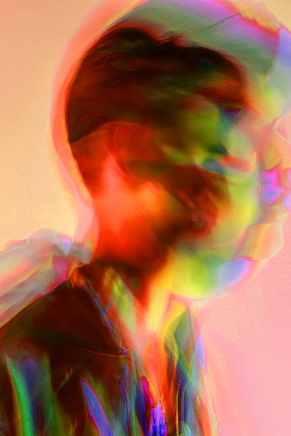 Motion blue image of a human face.
