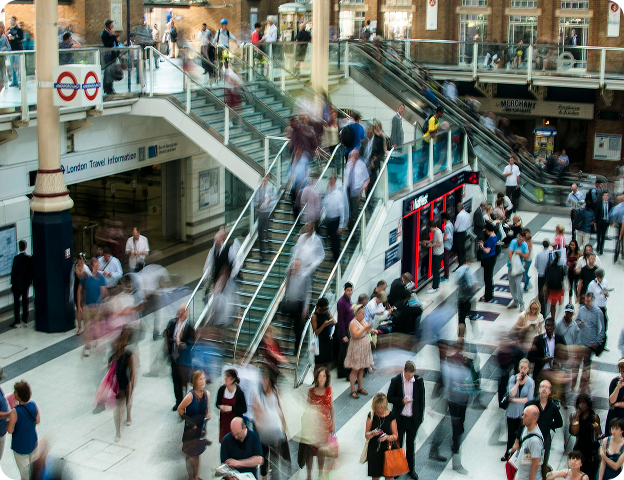 Zoomed out image of a crowded shopping mall.