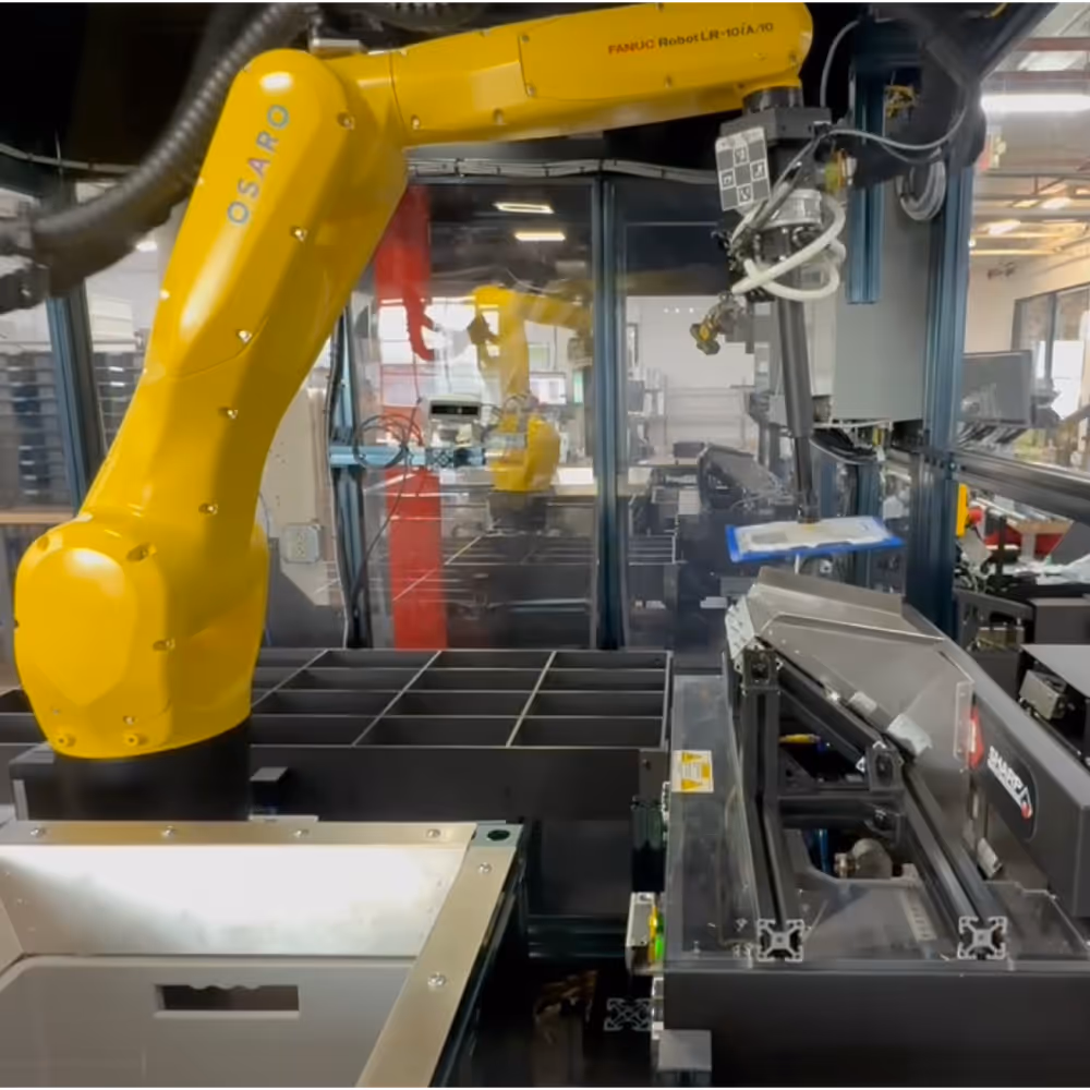 An OSARO robot bagging.
